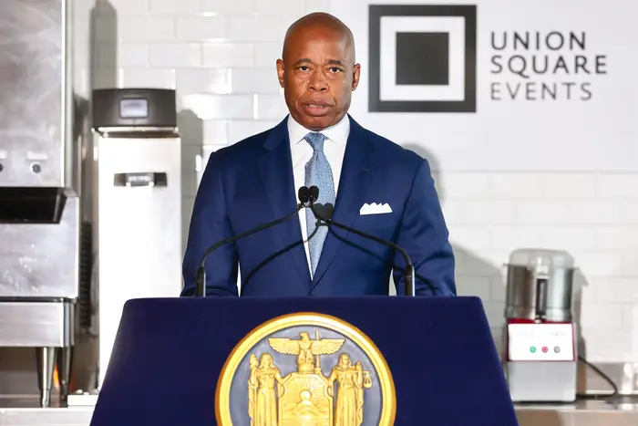 Mayor Eric Adams is seen calling for expedited work authorisation for asylum seekers in New York City.